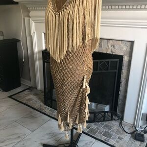 Ballroom Competition Rhythm/Latin Gold fringe Dress adorned with rhinestones.